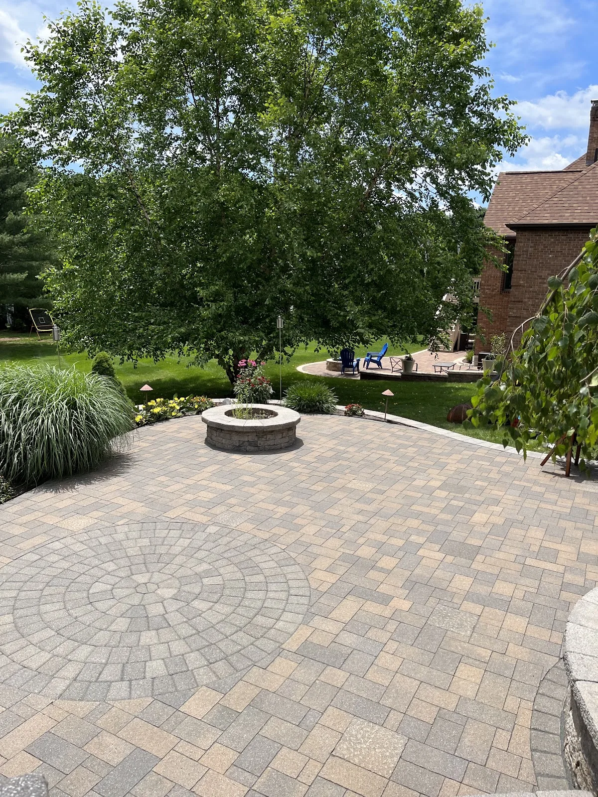 Interlocking paver patio freshly sealed by CleanScapes in Northwest Connecticut