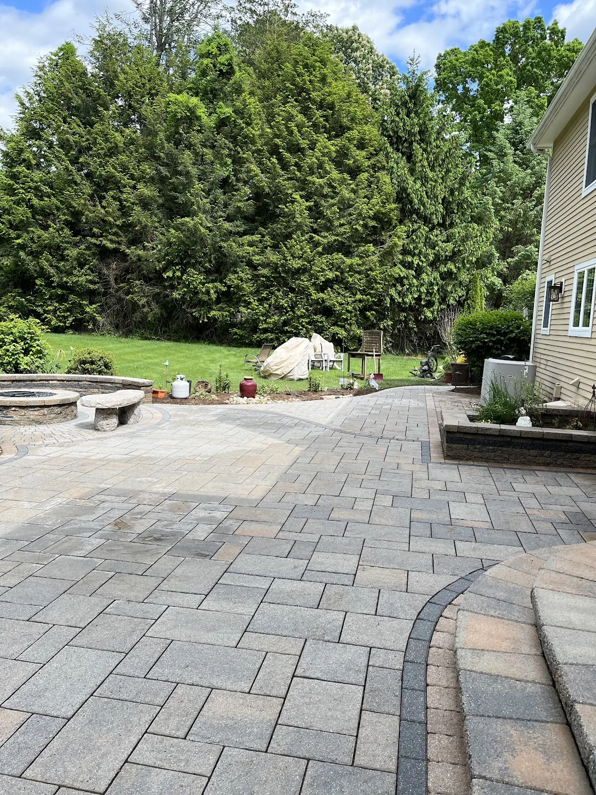 Interlocking paver patio during sealing work in Northwest Connecticut