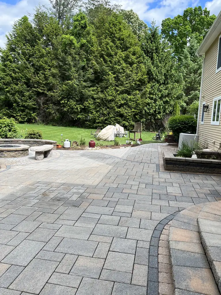 Multi-level patio, South Windsor Multi-level paver patio with curved steps and a fire pit area in South Windsor, CT