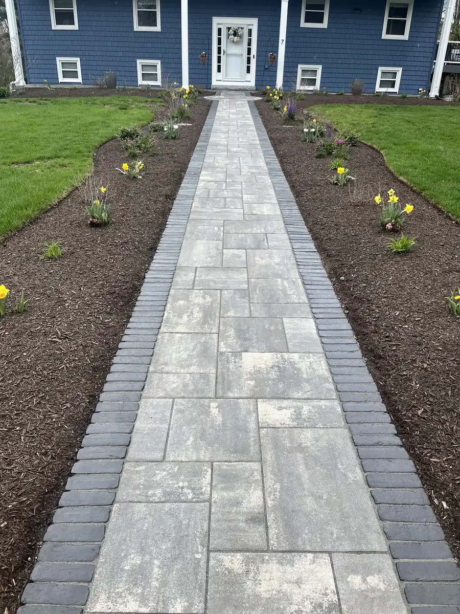 Front walk, Simsbury Straight slab paver front walk with a charcoal soldier border leading to a blue home in Simsbury, CT